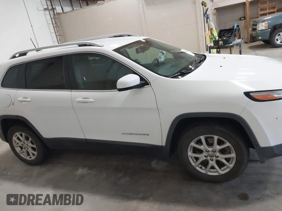 2016 Jeep Cherokee Latitude with VIN 1C4PJMCS5GW341286, listed as a IAAI auction lot 40723940 with 113,040 mi miles and . Bid and sale history available at DreamBid. Image 13.