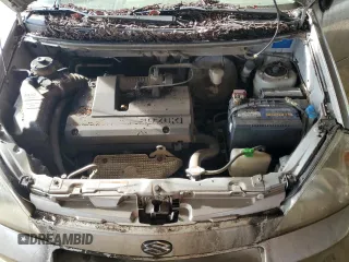 2004 Suzuki Aerio S z VIN JS2RA61S445207836, wystawiony jako Copart lot #48757125 z przebiegiem 96 400 mil mil oraz Czysty tytuł • Clean title. Historia ofert i sprzedaży dostępna na DreamBid. Obrazek 11.