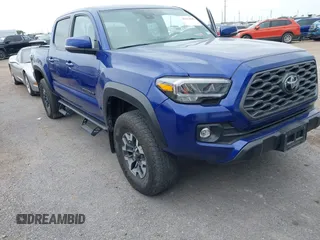 2022 Toyota Tacoma SR with VIN 3TMCZ5AN9NM525007, listed as a IAAI auction lot 42113845 with 38,557 mi miles and . Bid and sale history available at DreamBid. Image 1.