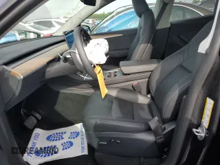 2024 Tesla Model Y Long Range z VIN 7SAYGDEE4RA251337, wystawiony jako Copart lot #59844555 z przebiegiem 16 011 mil mil oraz Szkoda całkowita • Salvage title. Historia ofert i sprzedaży dostępna na DreamBid. Obrazek 7.