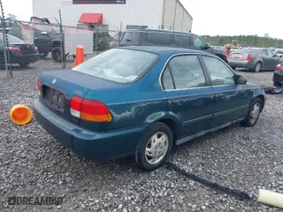1997 Honda Civic LX with VIN 2HGEJ6674VH584711, listed as a IAAI auction lot 41848808 with 210295 miles. Bid and sale history available at carsss.com. Image 4.