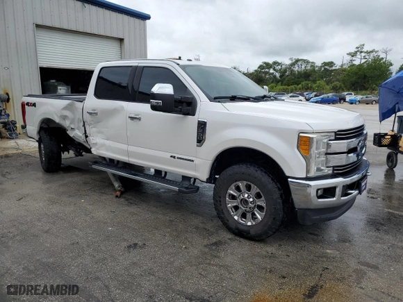 2017 Ford Super Duty F-250 SRW Lariat with VIN 1FT7W2BT8HEE15789, listed as a Copart auction lot 52038045 with 185,457 mi miles and Salvage Title. Bid and sale history available at carsss.com. Image 4.