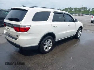 2012 Dodge Durango Crew with VIN 1C4RDHDG9CC152766, listed as a IAAI auction lot 42038931 with 288,545 mi miles and . Bid and sale history available at DreamBid. Image 4.