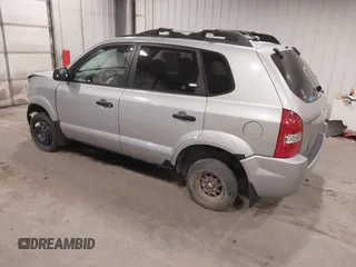 2006 Hyundai Tucson GL with VIN KM8JM12BX6U250937, listed as a IAAI auction lot 41529567 with 165,528 mi miles. Bid and sale history available at carsss.com. Image 3.