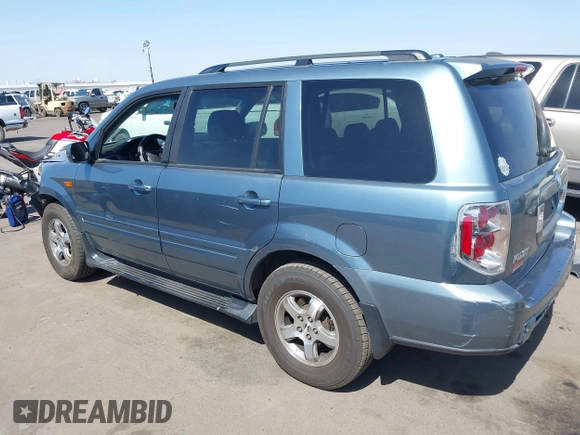 2006 Honda Pilot EX-L with VIN 2HKYF18536H548948, listed as a IAAI auction lot 36572651 with 242,758 mi miles and . Bid and sale history available at DreamBid. Image 3.