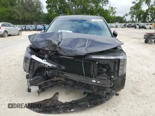 2025 Kia Carnival SX with VIN KNDNE5K37S6490478, listed as a Copart auction lot 51389565 with 6,929 mi miles and Salvage Title. Bid and sale history available at DreamBid. Image 5.