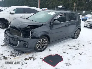 2018 Chevrolet Sonic LT z VIN 1G1JD6SB4J4106822, wystawiony jako IAAI lot #41591103 z przebiegiem 74 497 mil mil oraz . Historia ofert i sprzedaży dostępna na DreamBid. Obrazek 2.
