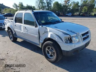 2004 Ford Explorer Sport Trac XLS z VIN 1FMZU67K24UB86026, wystawiony jako IAAI lot #41813286 z przebiegiem 134 377 mil mil oraz . Historia ofert i sprzedaży dostępna na DreamBid. Obrazek 1.