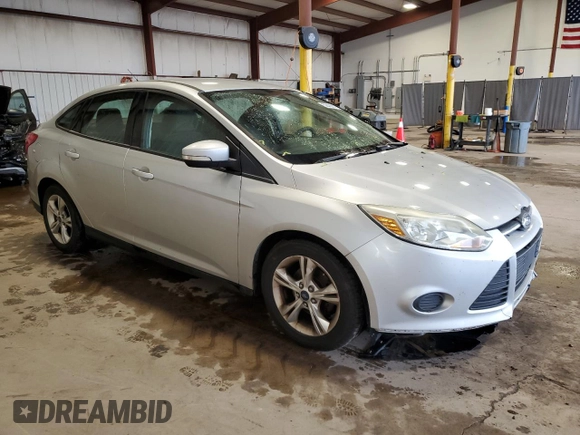 2013 Ford Focus SE z VIN 1FADP3F26DL314690, wystawiony jako Copart lot #58408575 z przebiegiem Nie podano mil oraz Szkoda całkowita • Salvage title. Historia ofert i sprzedaży dostępna na DreamBid. Obrazek 4.