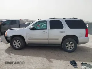 2014 GMC Yukon SLT with VIN 1GKS1CE02ER204452, listed as a IAAI auction lot 41804400 with 176,265 mi miles. Bid and sale history available at carsss.com. Image 14.