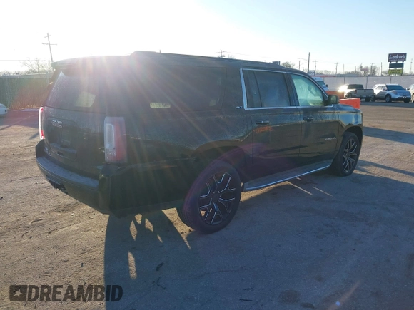 2015 GMC Yukon XL SLT with VIN 1GKS1HKC3FR250207, listed as a IAAI auction lot 41424234 with 183,233 mi miles. Bid and sale history available at carsss.com. Image 4.