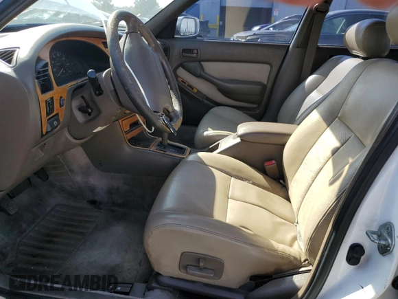 1996 Toyota Camry LE z VIN JT2BF12K3T0139807, wystawiony jako Copart lot #57675855 z przebiegiem 258 601 mil mil oraz Szkoda całkowita • Salvage title. Historia ofert i sprzedaży dostępna na DreamBid. Obrazek 7.