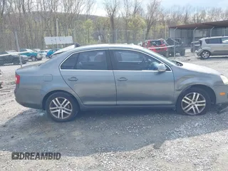 2005 Volkswagen Jetta Sedan 2.5L with VIN 3VWSG71K35M617763, listed as a IAAI auction lot 41963065 with 200,915 mi miles. Bid and sale history available at carsss.com. Image 13.
