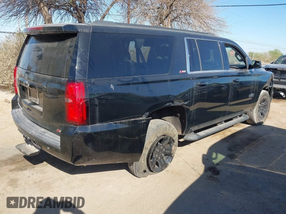 2020 Chevrolet Suburban LT with VIN 1GNSKHKC5LR303081, listed as a IAAI auction lot 41896511 with 60,121 mi miles and . Bid and sale history available at DreamBid. Image 4.