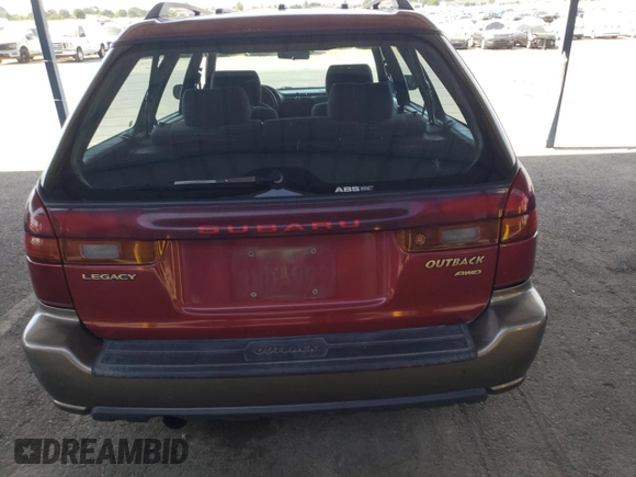 1998 Subaru Legacy Outback with VIN 4S3BG6857W7618150, listed as a Copart auction lot 63257465 with 419,599 mi miles and Salvage title. Bid and sale history available at DreamBid. Image 6.