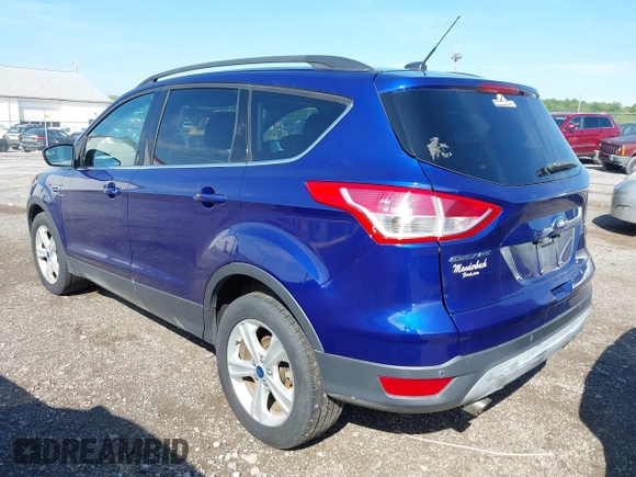 2014 Ford Escape SE with VIN 1FMCU9GX1EUB52373, listed as a IAAI auction lot 42163933 with 128,634 mi miles. Bid and sale history available at carsss.com. Image 3.