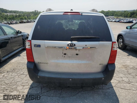 2009 Kia Sedona LX with VIN KNDMB233096296810, listed as a Copart auction lot 64614694 with 231,572 mi miles and Salvage Title. Bid and sale history available at carsss.com. Image 6.