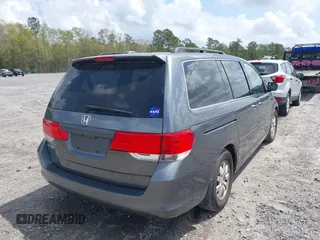 2010 Honda Odyssey EX-L with VIN 5FNRL3H76AB010388, listed as a IAAI auction lot 41963396 with 197,835 mi miles. Bid and sale history available at carsss.com. Image 4.