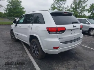 2021 Jeep Grand Cherokee 80th Anniversary with VIN 1C4RJFBG2MC568028, listed as a IAAI auction lot 42381104 with 51,027 mi miles and . Bid and sale history available at DreamBid. Image 3.