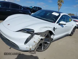 2021 Porsche Taycan 4S z VIN WP0AB2Y12MSA43873, wystawiony jako IAAI lot #41703233 z przebiegiem 24 452 mil mil oraz . Historia ofert i sprzedaży dostępna na DreamBid. Obrazek 2.