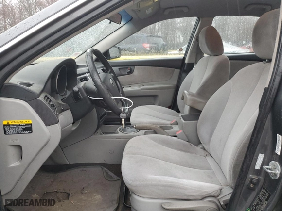 2009 Kia Optima LX with VIN KNAGE228495309675, listed as a Copart auction lot 49705575 with 140,613 mi miles and Salvage Title. Bid and sale history available at carsss.com. Image 7.