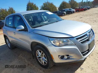 2011 Volkswagen Tiguan SE with VIN WVGBV7AX5BW549090, listed as a IAAI auction lot 41550983 with 153,739 mi miles and . Bid and sale history available at DreamBid. Image 1.