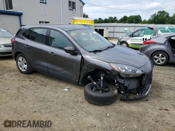 2020 Ford Escape S with VIN 1FMCU9F63LUA19619, listed as a Copart auction lot 57279464 with 85,595 mi miles and Salvage title. Bid and sale history available at DreamBid. Image 4.
