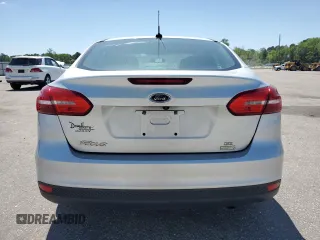 2018 Ford Focus SE with VIN 1FADP3FE0JL202442, listed as a Copart auction lot 53468725 with 106,119 mi miles and Salvage title. Bid and sale history available at DreamBid. Image 6.