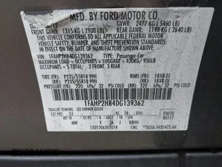 2013 Ford Taurus SEL z VIN 1FAHP2H84DG139362, wystawiony jako IAAI lot #42367272 z przebiegiem 232 500 mil mil oraz . Historia ofert i sprzedaży dostępna na DreamBid. Obrazek 9.