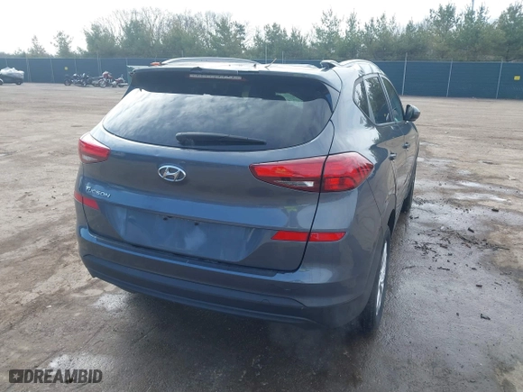 2019 Hyundai Tucson Value with VIN KM8J33A40KU999340, listed as a IAAI auction lot 41876380 with 52,752 mi miles. Bid and sale history available at carsss.com. Image 4.