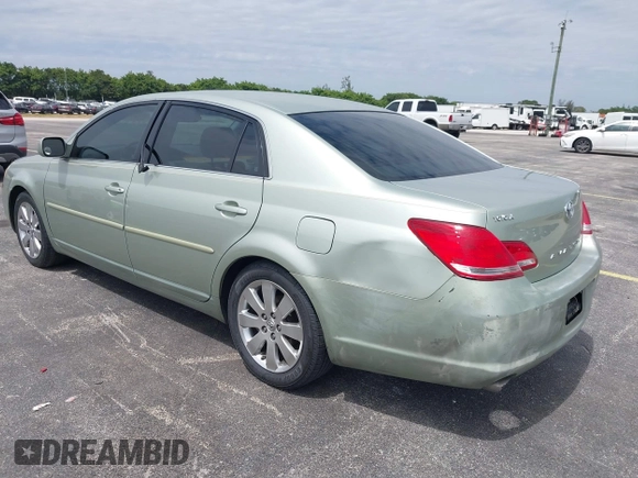 2007 Toyota Avalon XL with VIN 4T1BK36B27U219456, listed as a IAAI auction lot 41747807 with 169,599 mi miles. Bid and sale history available at carsss.com. Image 3.