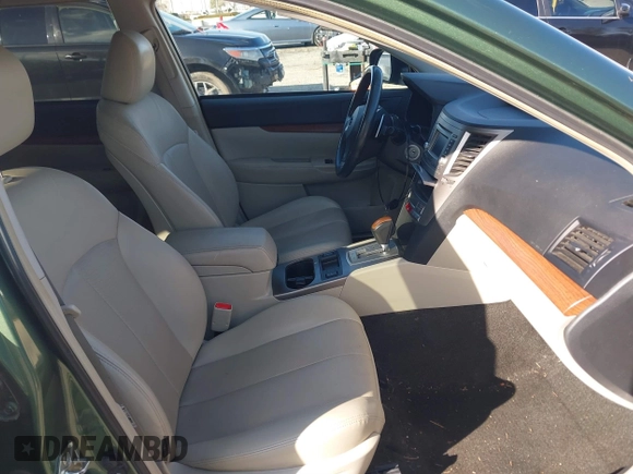 2014 Subaru Outback Limited with VIN 4S4BRBLC9E3238964, listed as a IAAI auction lot 41626397 with 132,510 mi miles and . Bid and sale history available at DreamBid. Image 5.