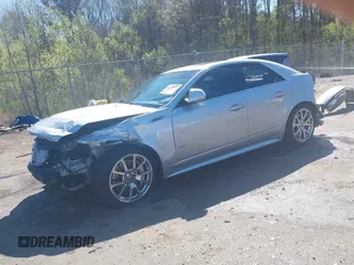 2009 Cadillac CTS-V z VIN 1G6DN57P090167350, wystawiony jako IAAI lot #41820827 z przebiegiem 210 266 mil mil oraz . Historia ofert i sprzedaży dostępna na DreamBid. Obrazek 2.
