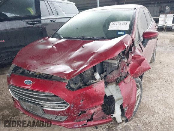 2017 Ford Fiesta SE z VIN 3FADP4BJ9HM159284, wystawiony jako IAAI lot #41291003 z przebiegiem 79 668 mil mil oraz . Historia ofert i sprzedaży dostępna na DreamBid. Obrazek 6.