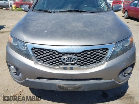 2012 Kia Sorento EX with VIN 5XYKU3A60CG305675, listed as a IAAI auction lot 42647223 with 174,447 mi miles and . Bid and sale history available at DreamBid. Image 6.