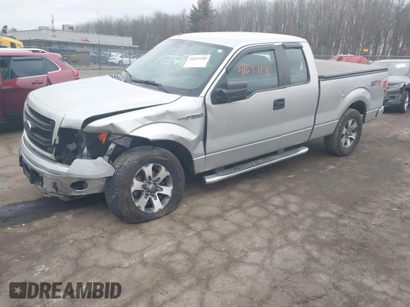 2014 Ford F-150 XL with VIN 1FTFX1EF2EFC81067, listed as a IAAI auction lot 41697190 with 105,584 mi miles. Bid and sale history available at carsss.com. Image 18.