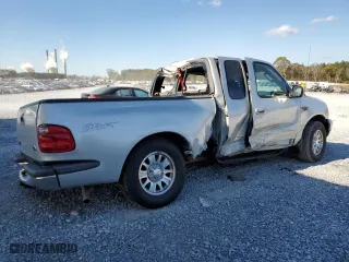 2003 Ford F-150 XL with VIN 1FTRX07W03KB17955, listed as a Copart auction lot 83061424 with 164,529 mi miles and Salvage Title. Bid and sale history available at carsss.com. Image 3.