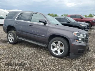 2015 Chevrolet Tahoe LT with VIN 1GNSCBKC3FR282603, listed as a Copart auction lot 50191155 with 219,272 mi miles and Salvage Title. Bid and sale history available at DreamBid. Image 4.