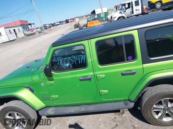 2019 Jeep Wrangler Unlimited Sahara with VIN 1C4HJXEN1KW592876, listed as a IAAI auction lot 42039474 with 66,506 mi miles and . Bid and sale history available at DreamBid. Image 15.