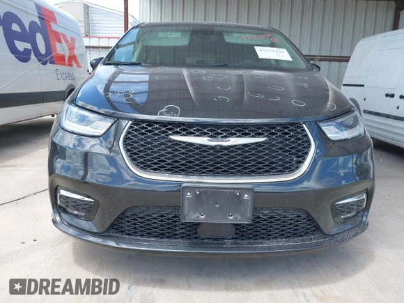 2023 Chrysler Pacifica Touring L with VIN 2C4RC1BG1PR550628, listed as a IAAI auction lot 42553430 with 61,773 mi miles and . Bid and sale history available at DreamBid. Image 6.