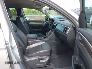 2018 Volkswagen Atlas SE z VIN 1V2DR2CAXJC521412, wystawiony jako IAAI lot #42309661 z przebiegiem 99 045 mil mil oraz . Historia ofert i sprzedaży dostępna na DreamBid. Obrazek 5.