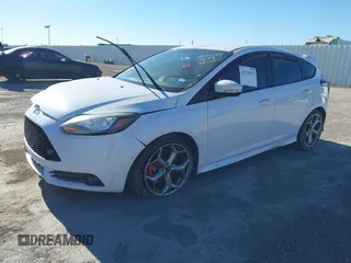 2014 Ford Focus ST with VIN 1FADP3L98EL308831, listed as a IAAI auction lot 41138622 with 133,317 mi miles and . Bid and sale history available at carsss.com. Image 2.