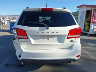 2015 Dodge Journey SXT with VIN 3C4PDCBG8FT673824, listed as a IAAI auction lot 41603661 with 169,939 mi miles and . Bid and sale history available at DreamBid. Image 16.