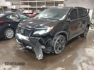 2020 Honda Passport EX-L with VIN 5FNYF8H53LB013931, listed as a IAAI auction lot 41614095 with 68,537 mi miles and . Bid and sale history available at DreamBid. Image 6.