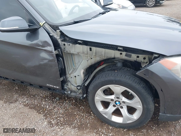 2013 BMW X1 28i with VIN WBAVM1C51DVW42577, listed as a IAAI auction lot 42029627 with 140,343 mi miles. Bid and sale history available at carsss.com. Image 6.