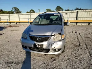 2003 Mazda MPV LX with VIN JM3LW28J530336307, listed as a Copart auction lot 82298964 with 148,449 mi miles and Salvage Title. Bid and sale history available at carsss.com. Image 12.