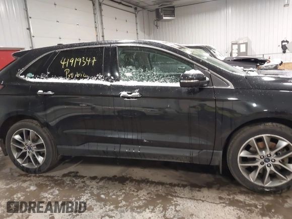 2015 Ford Edge Titanium z VIN 2FMTK4K91FBB27482, wystawiony jako IAAI lot #41919347 z przebiegiem 177 268 mil mil oraz . Historia ofert i sprzedaży dostępna na DreamBid. Obrazek 13.