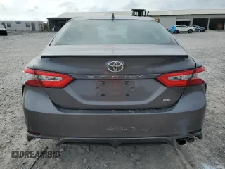 2020 Toyota Camry SE z VIN 4T1G11AK8LU927869, wystawiony jako Copart lot #57242235 z przebiegiem 85 487 mil mil oraz Szkoda całkowita • Salvage title. Historia ofert i sprzedaży dostępna na DreamBid. Obrazek 6.