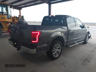 2015 Ford F-150 XL with VIN 1FTEW1CF1FKD55749, listed as a IAAI auction lot 41242324 with 164,415 mi miles. Bid and sale history available at carsss.com. Image 4.