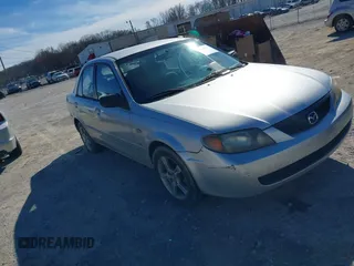 2003 Mazda Protege DX with VIN JM1BJ225X30156206, listed as a IAAI auction lot 41648833 with 199,444 mi miles and . Bid and sale history available at DreamBid. Image 1.